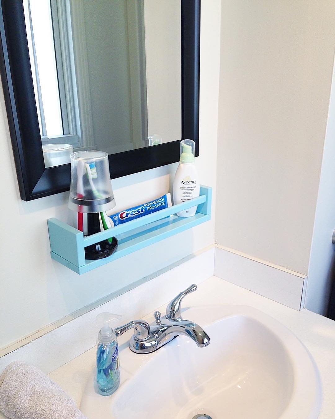 Maximize Space with Under-Mirror Shelving