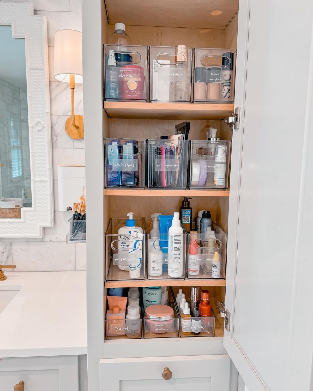 Organize Bathroom Essentials with Clear Bins