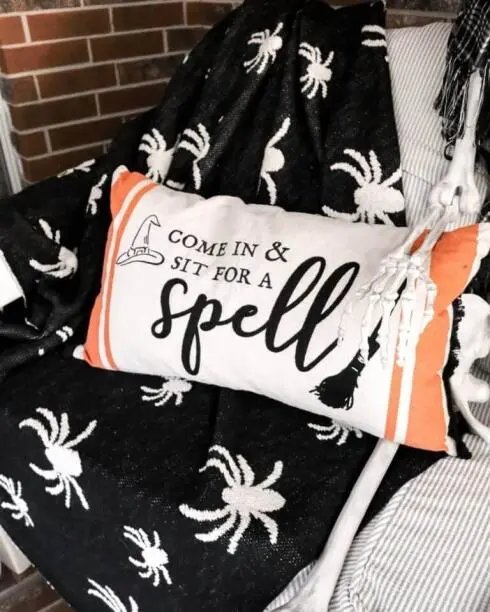 Black Throw with Skeleton Pillow