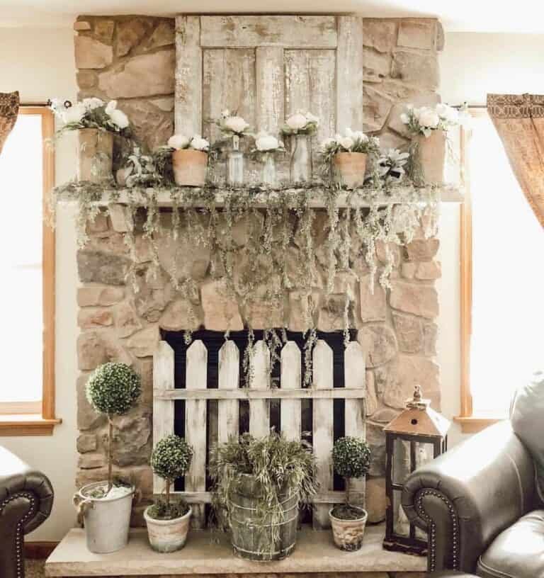 Stone Fireplace With Greenery