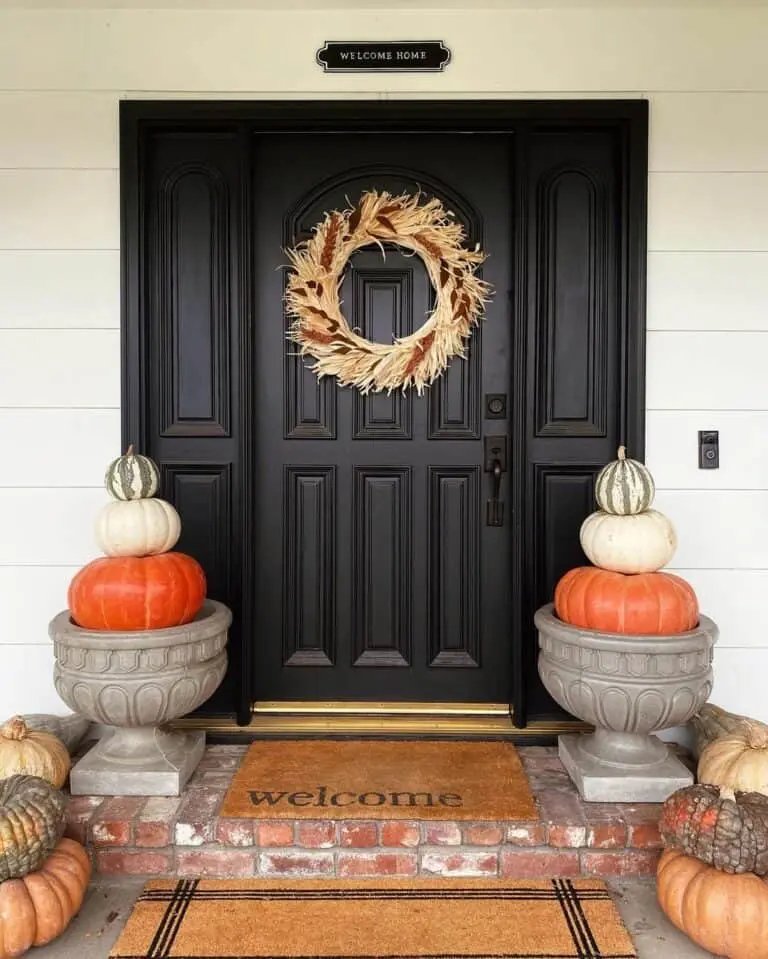 Black door with fall wreath