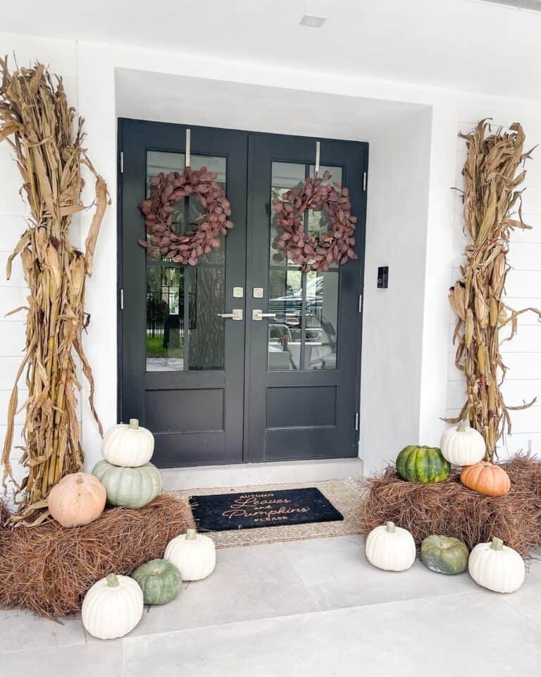 Black Doors with Straw Bales