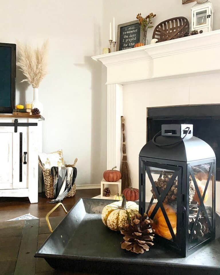 Black fall lantern with pumpkins