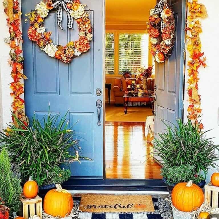 Blue French doors with autumn garlands