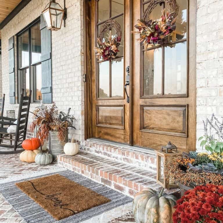 Brown wreaths on brick house