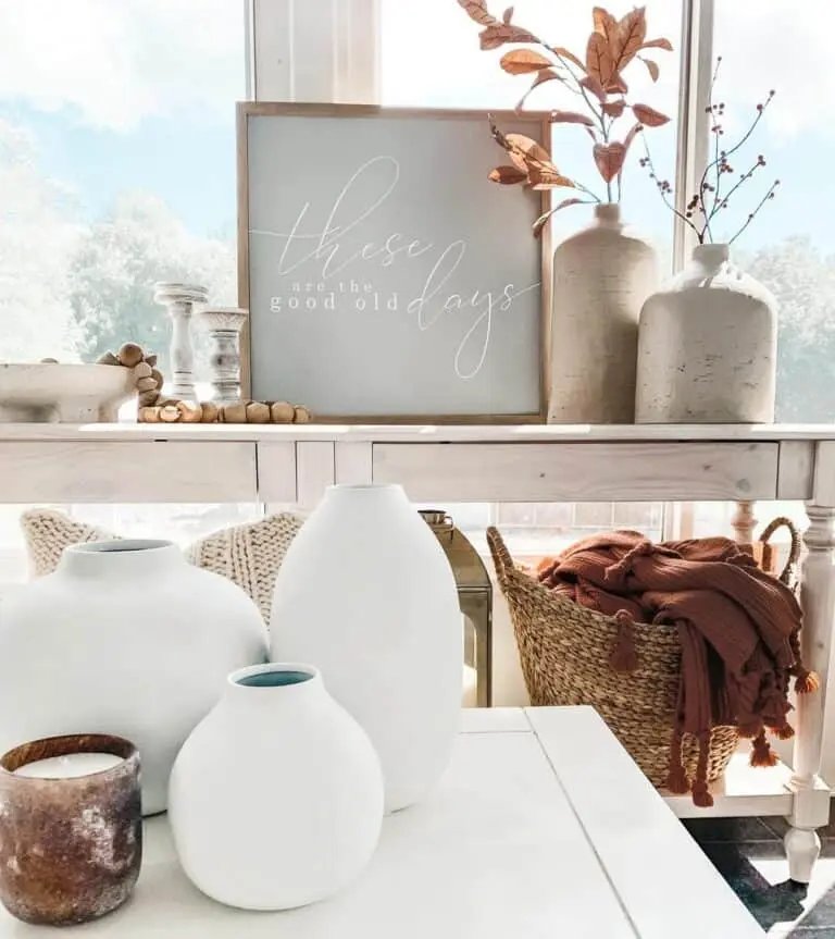 Ceramic vases with autumn leaves