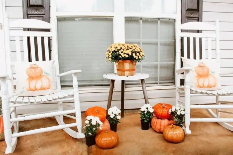 Cottage porch with pumpkins