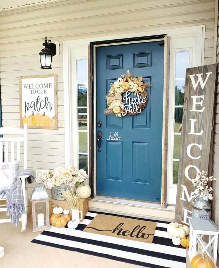 Dark teal door with wreath