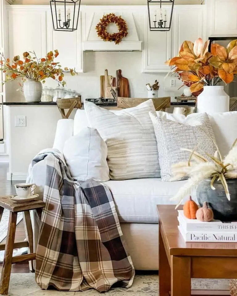 Fall living room with plaid and pumpkins