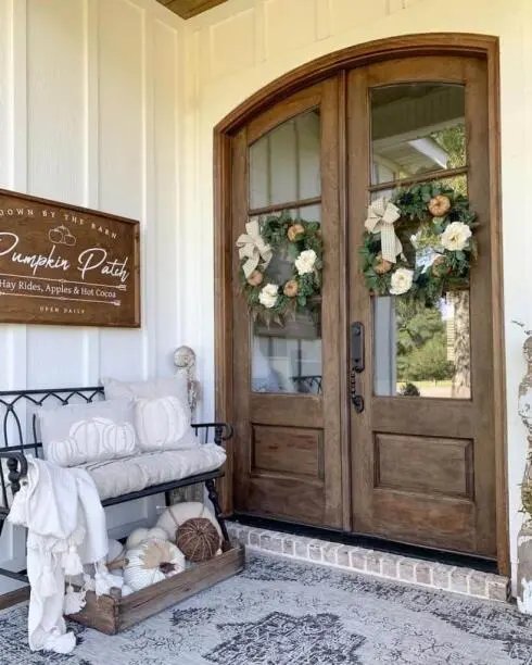 Fall wreaths and bench seating