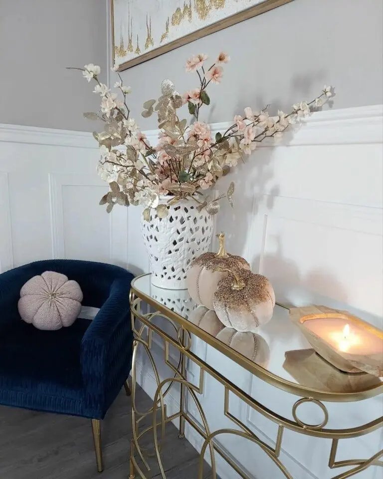 Glittering Pumpkins on Brass Table