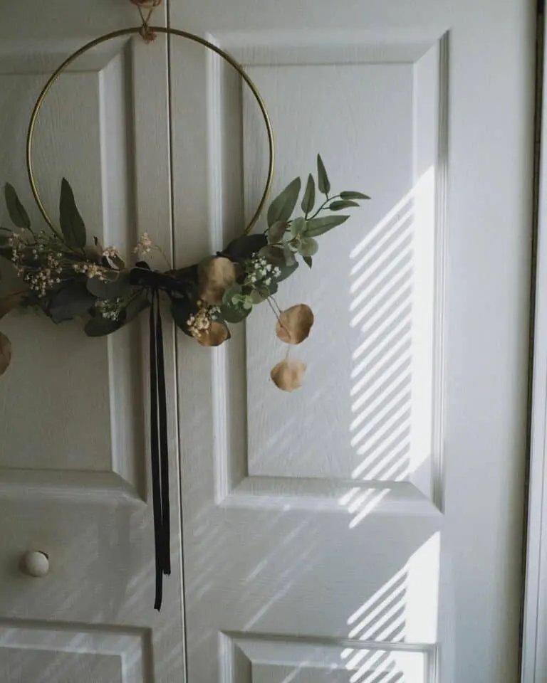 Gold hoop wreath on gray door