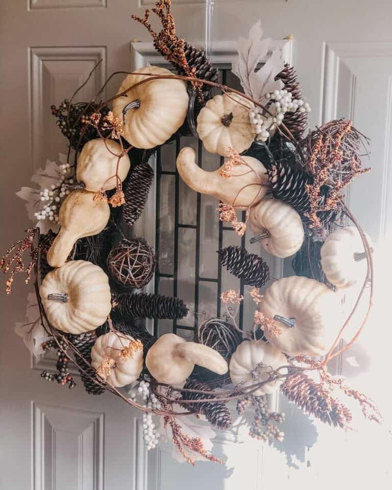 Grapevine wreath with beige pumpkins