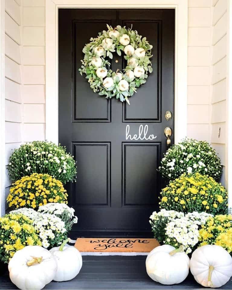 Green wreath white pumpkins