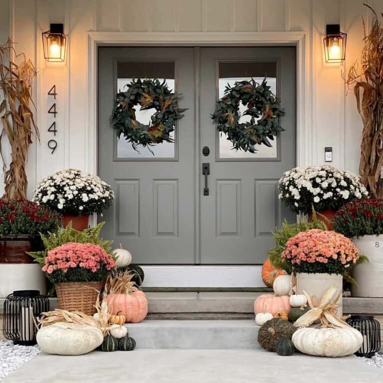 Green wreaths on grey door