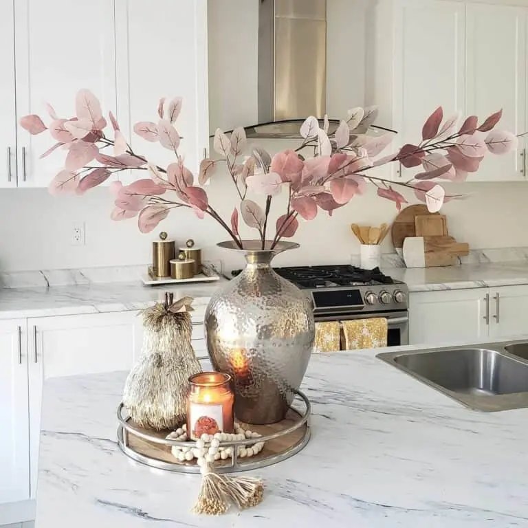 Metallic vase with fall leaves