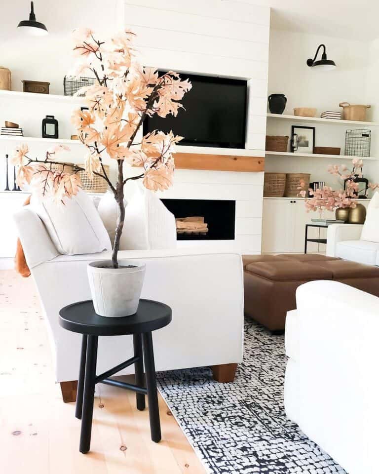 Monochrome room with orange plants