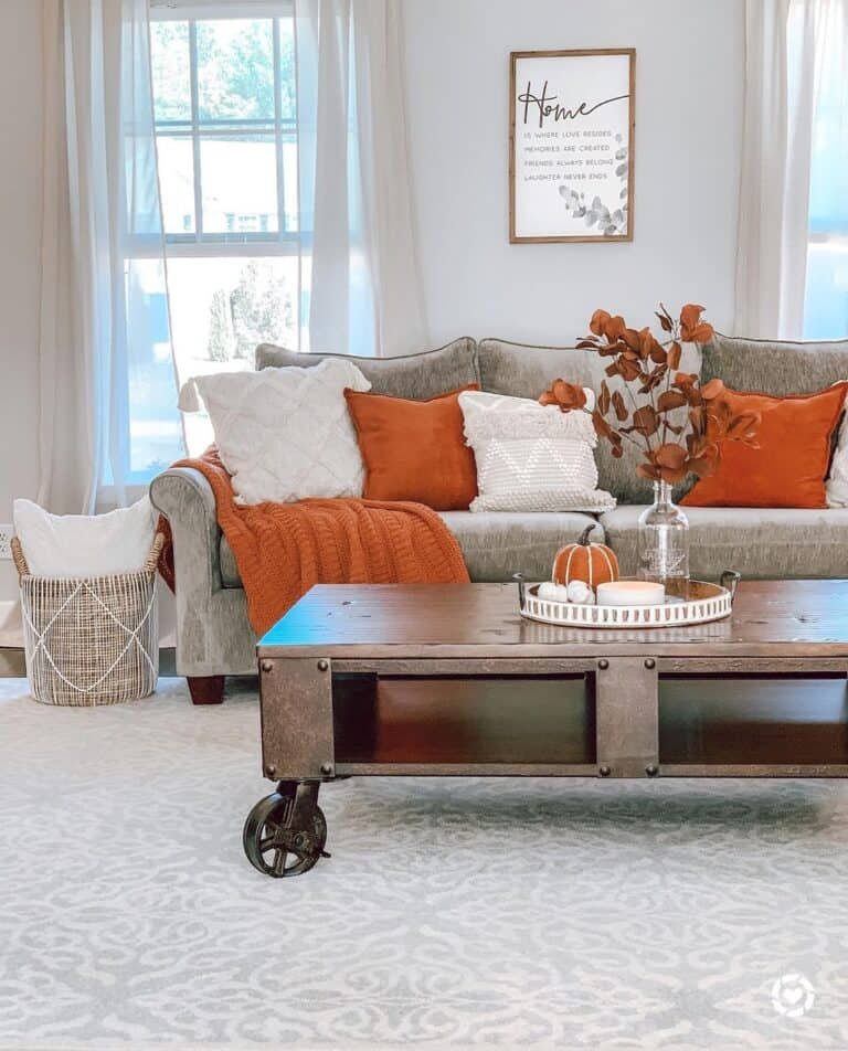 Neutral room with burnt orange accents