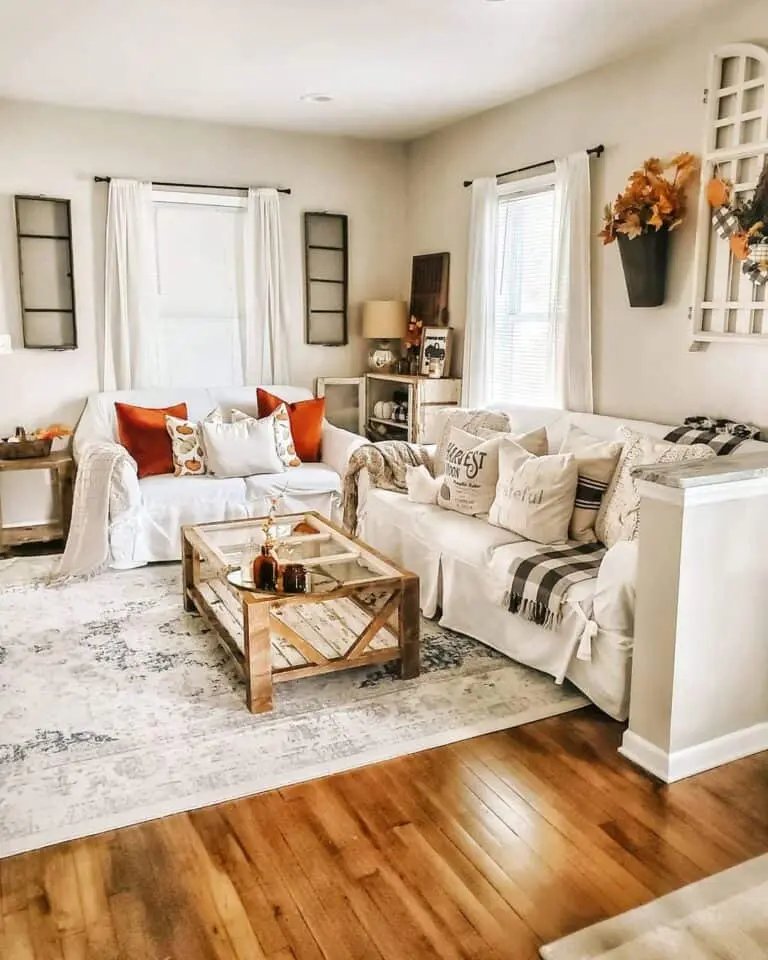 Neutral sofa with orange cushions