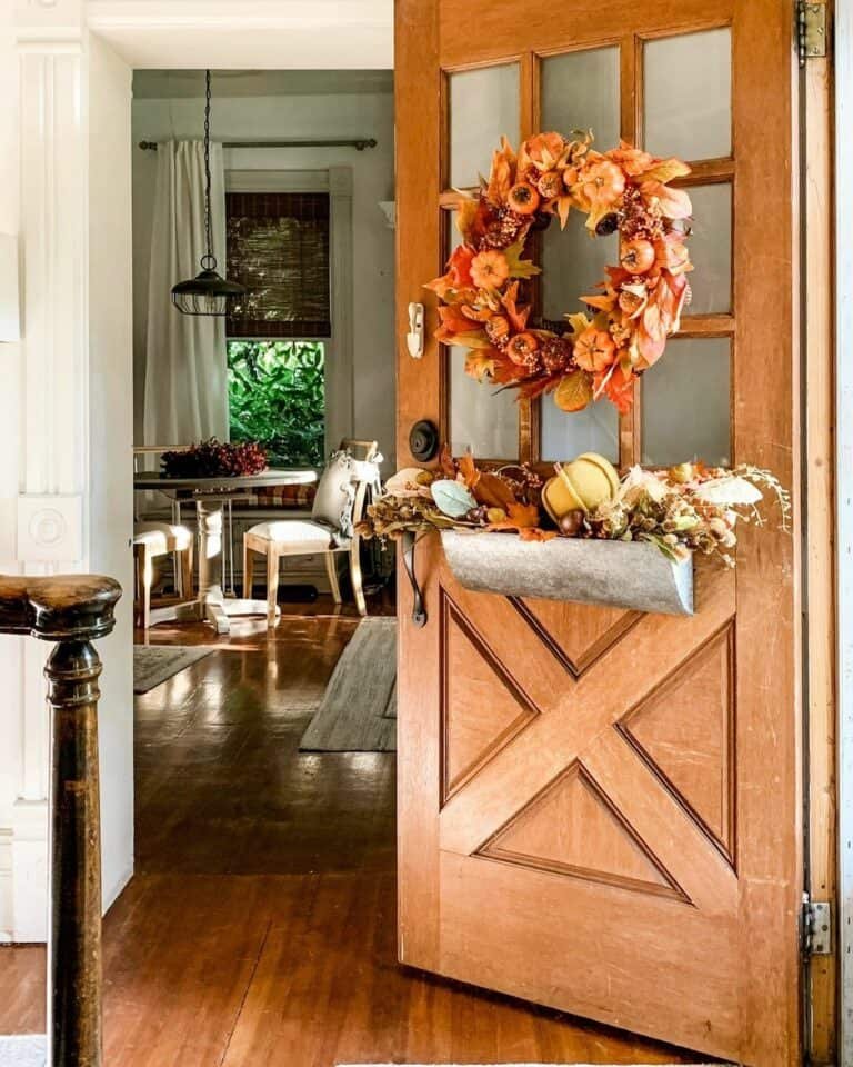Orange leaf wreath with pumpkins