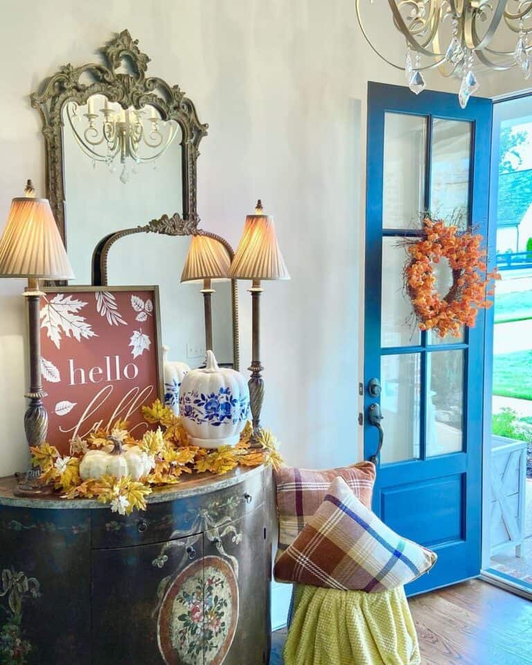Orange wreath on black door
