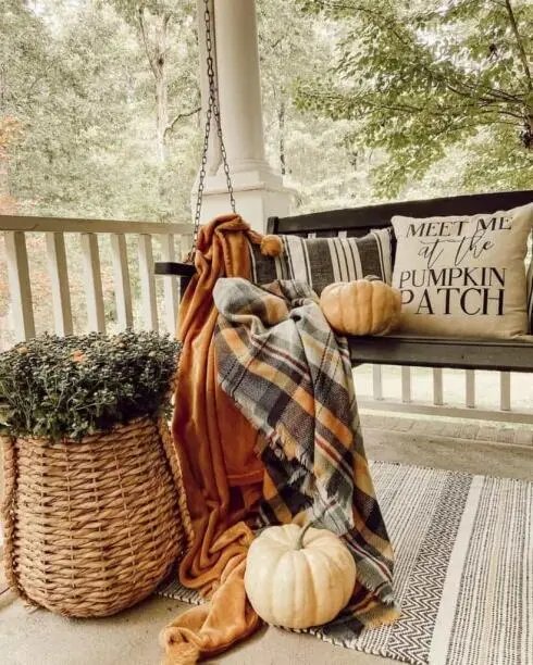 Patterned throws and pillows in a cozy hammock