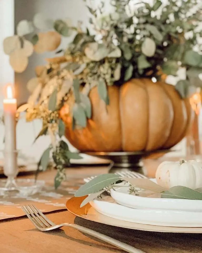 Pumpkin centerpiece with gold charger