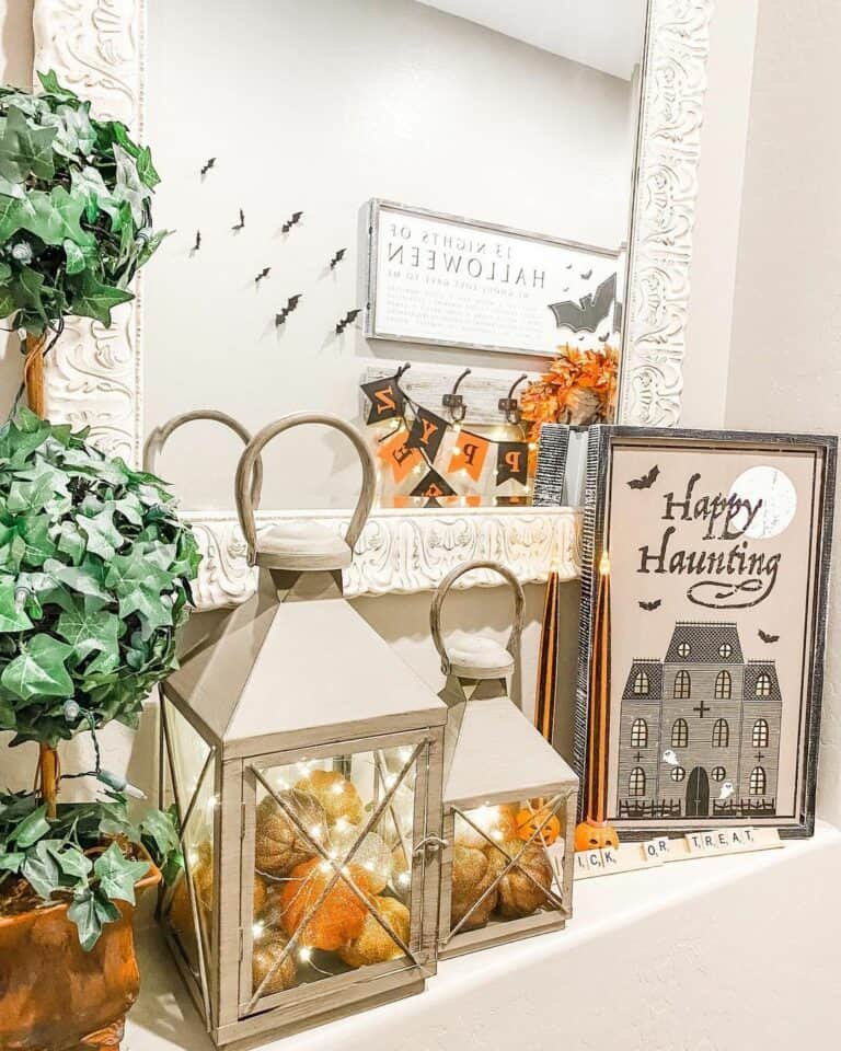 Pumpkin-filled lanterns with warm glow