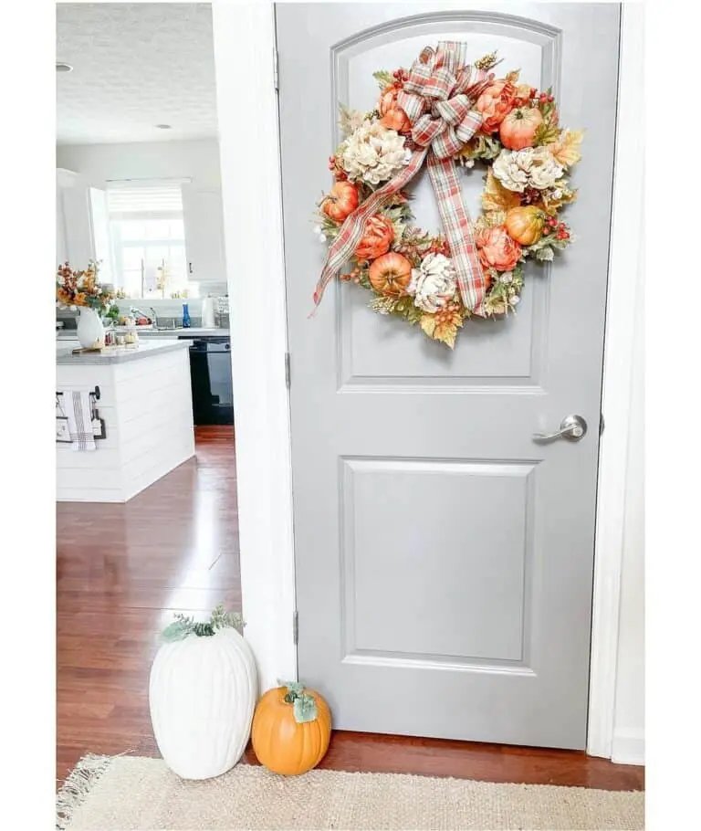Pumpkin wreath with plaid ribbon
