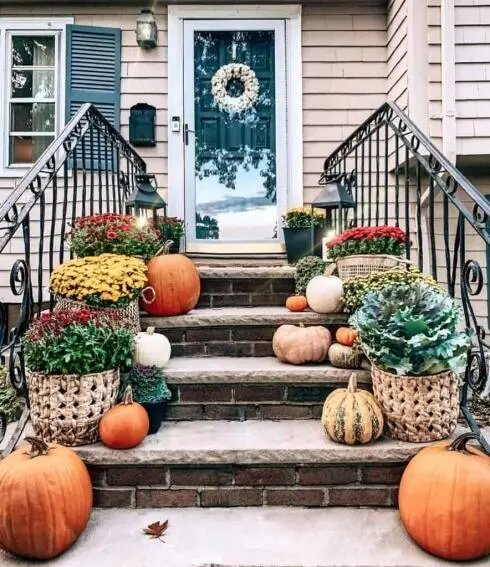 Pumpkins and greenery on stairs