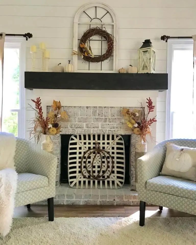Rustic brick fireplace with fall florals