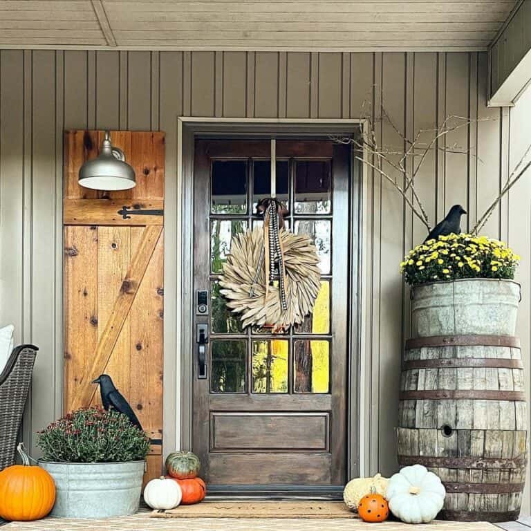 Rustic brown wreath with black and orange ribbons