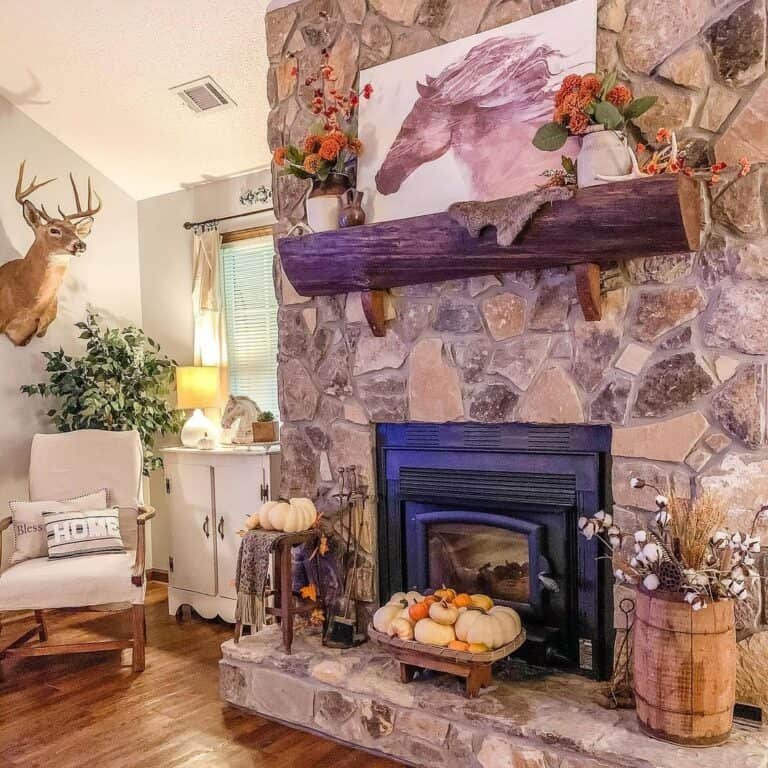 Rustic Log Mantel with Pumpkins