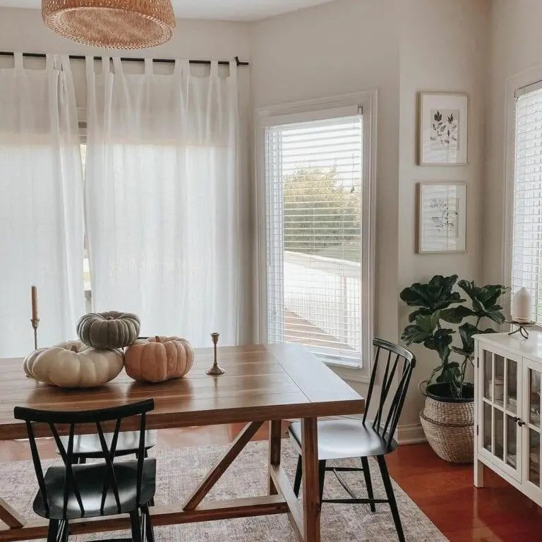 Stacked Pumpkins on Wood Table