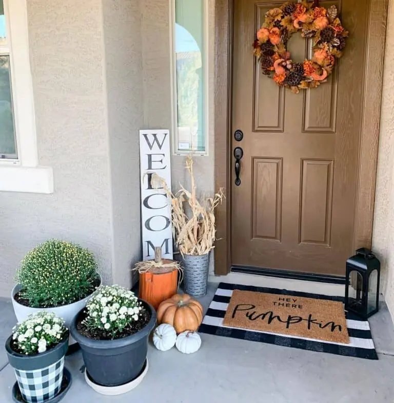 Stained Wood Door with Orange Wreath