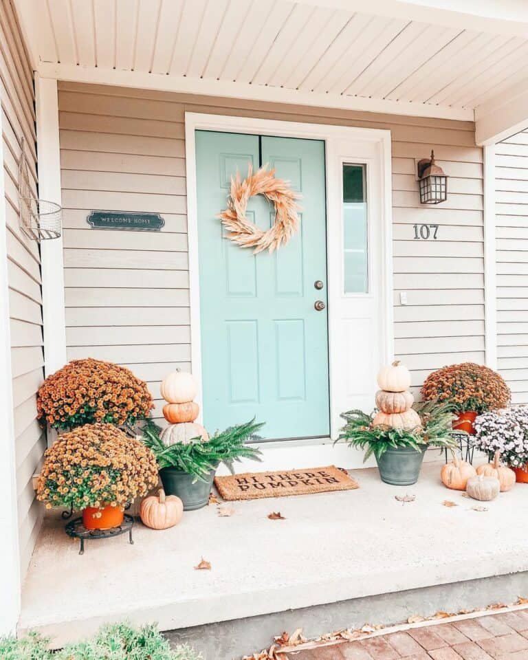 Straw wreath and pumpkin stacks