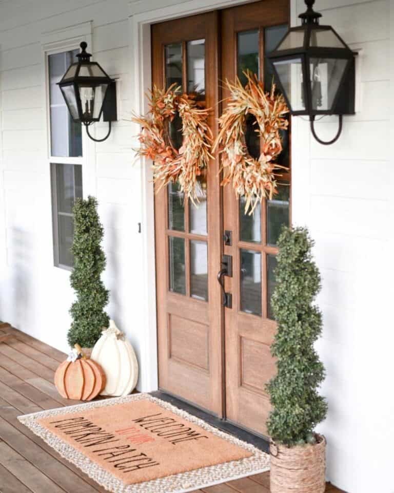 Straw wreaths on mahogany doors