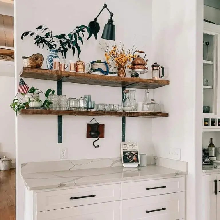 Swing-arm sconce over wood shelves