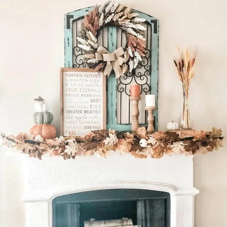 Teal doors with autumn wreath