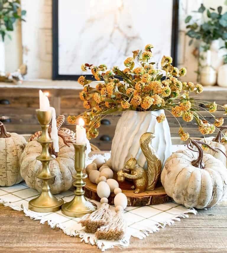White and brass centerpiece