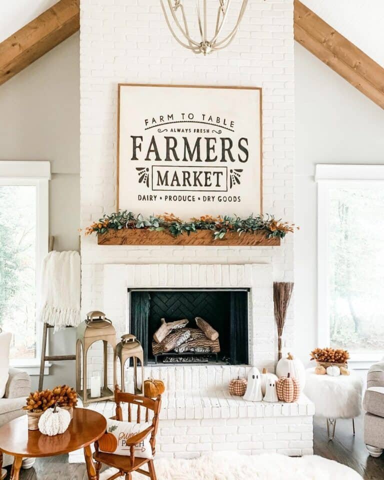 White Brick Fireplace with Farmhouse Pumpkins