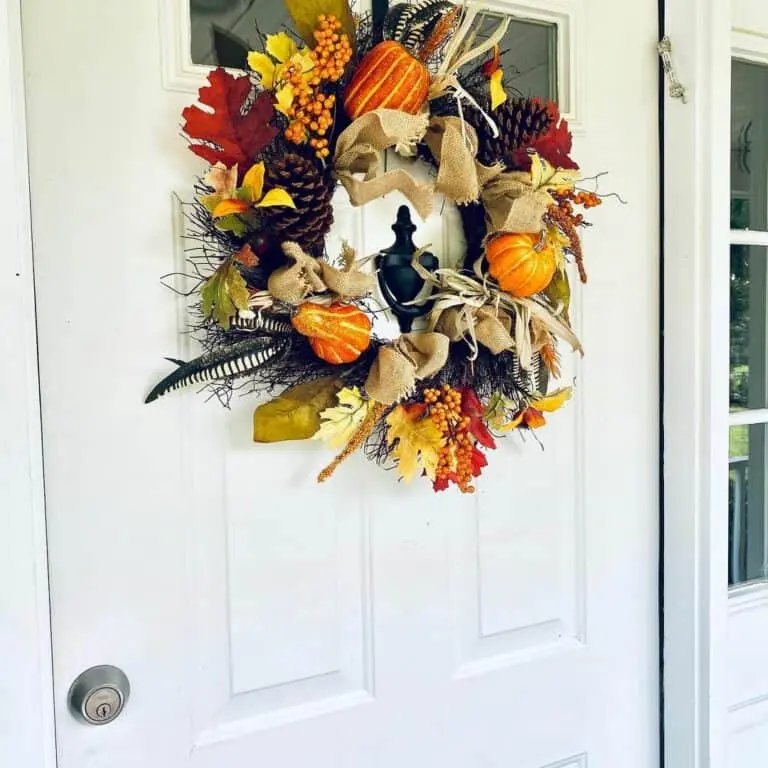 White door with autumn wreath