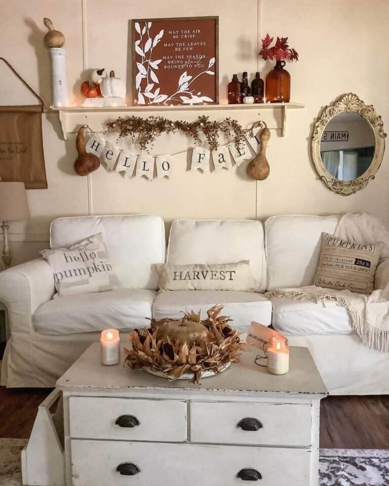 White living room with autumn accents