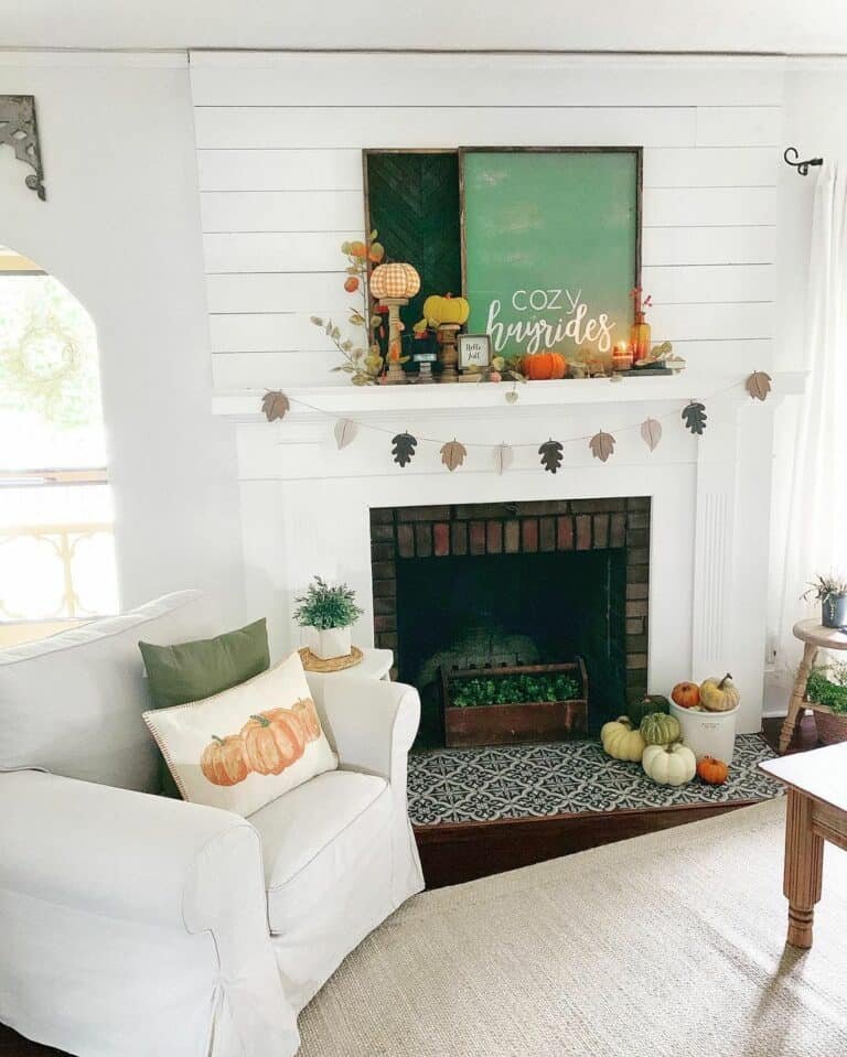 White mantel with autumn accents