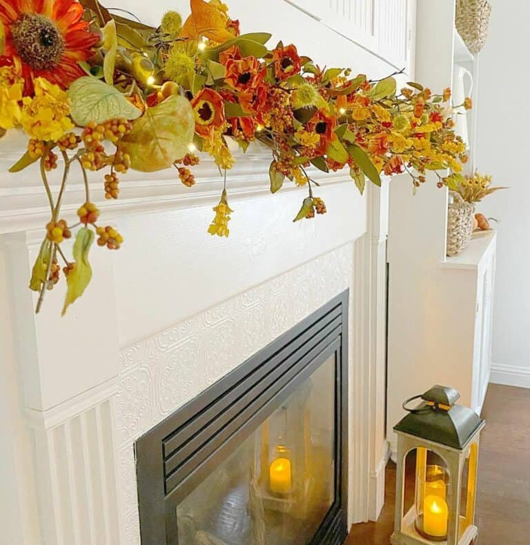 White mantel with fall garland