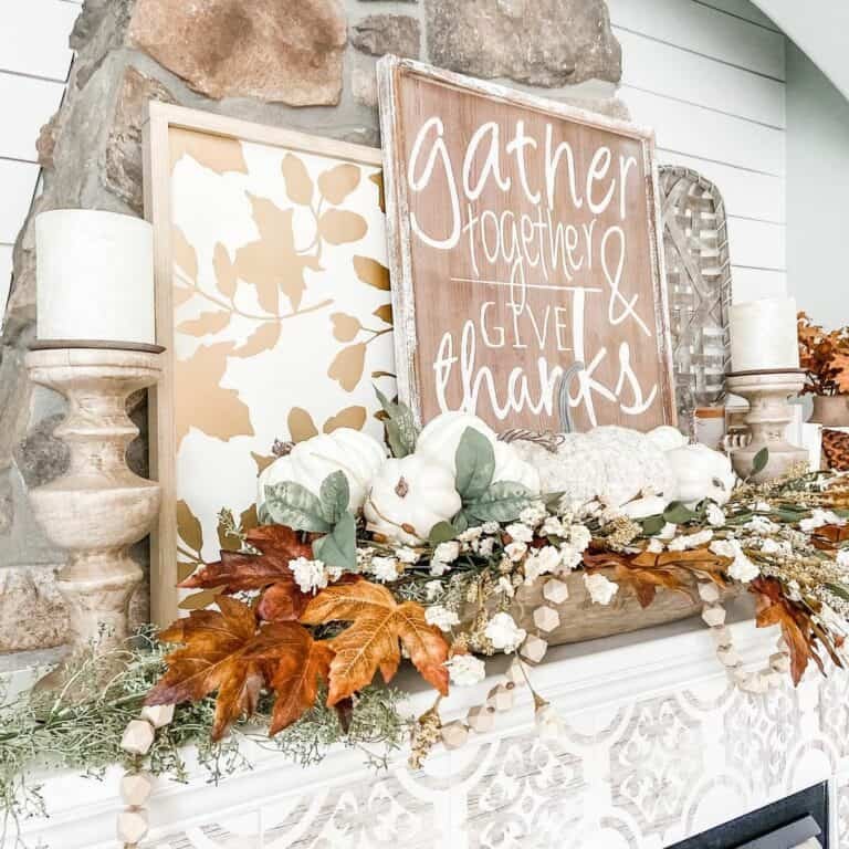 White mantel with wood signs