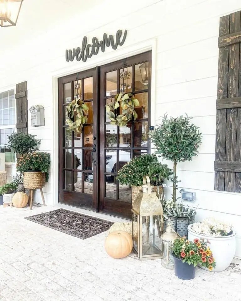 White porch with wood doors