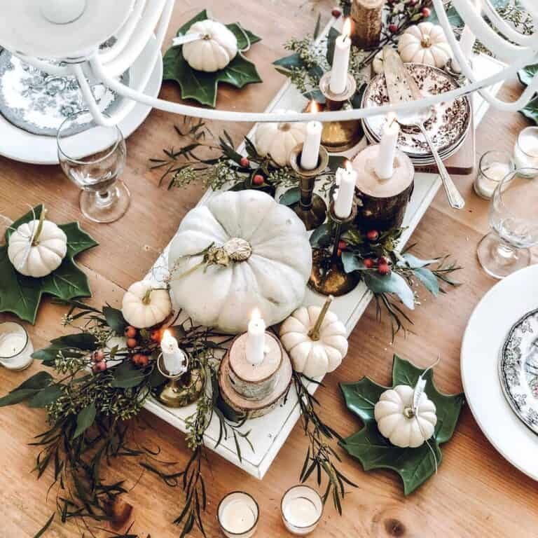 White pumpkins and green patterned china