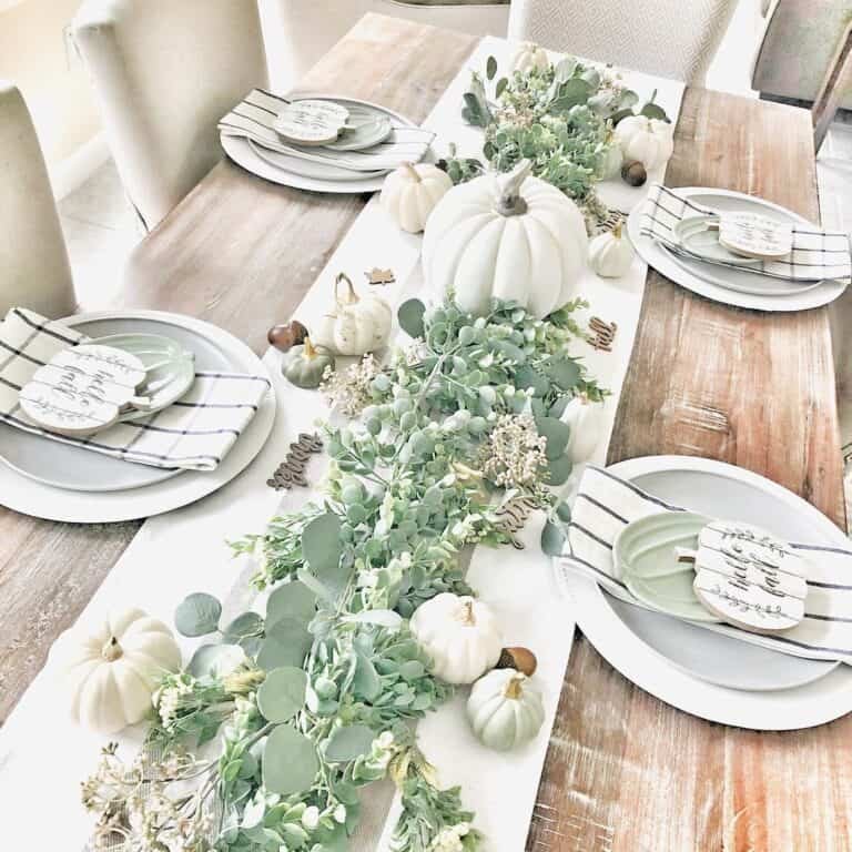 White pumpkins on neutral table