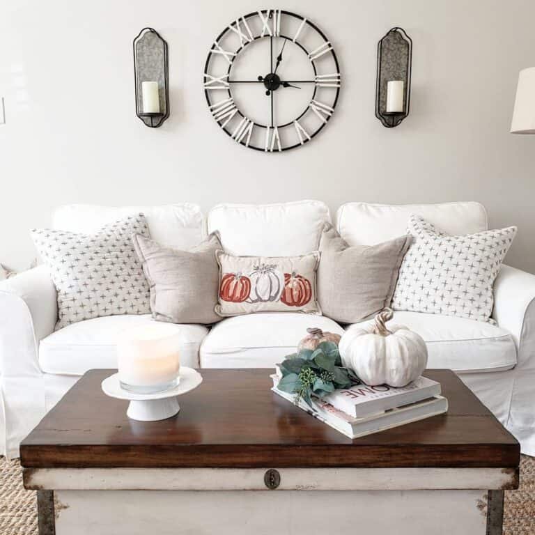 White sofa with fall accents